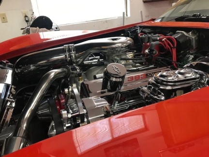 Janet W completing installation of a new fuel tank on her 69 Vette on 4/04/20